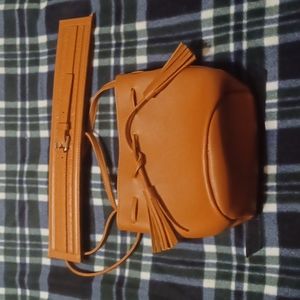 Belt with 'buckle' design